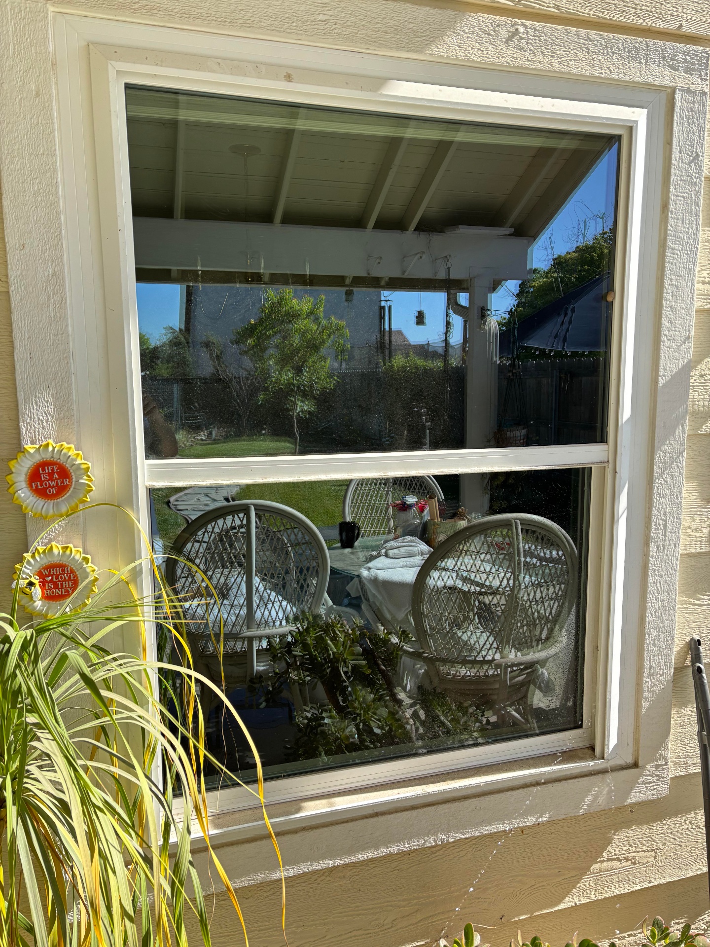 Window before cleaning - dirty with water spots